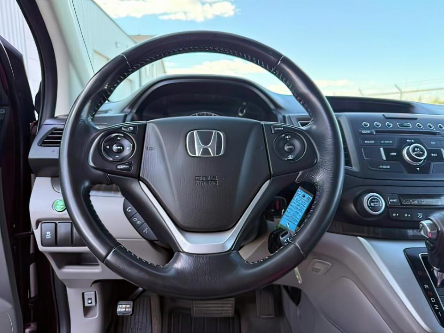 2013 MAROON /Black Honda CR-V (5J6RM4H79DL) with an 24L I-4 DOHC engine, Automatic transmission, located at 1175 N Woodruff Ave, Idaho Falls, ID, 83401, 43.506901, -111.999657 - At Timberline Auto, finding a great deal on your next vehicle is always easy! Our experienced sales staff goal is to help find you the right vehicle at the right price! Our knowledgeable finance department has options for almost any credit score. We offer extended service contract options to prot- Photo#16