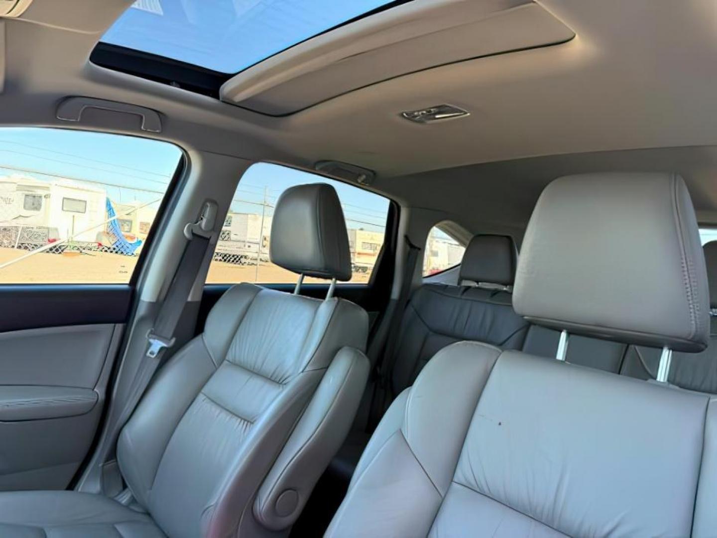 2013 MAROON /Black Honda CR-V (5J6RM4H79DL) with an 24L I-4 DOHC engine, Automatic transmission, located at 1175 N Woodruff Ave, Idaho Falls, ID, 83401, 43.506901, -111.999657 - At Timberline Auto, finding a great deal on your next vehicle is always easy! Our experienced sales staff goal is to help find you the right vehicle at the right price! Our knowledgeable finance department has options for almost any credit score. We offer extended service contract options to prot- Photo#23