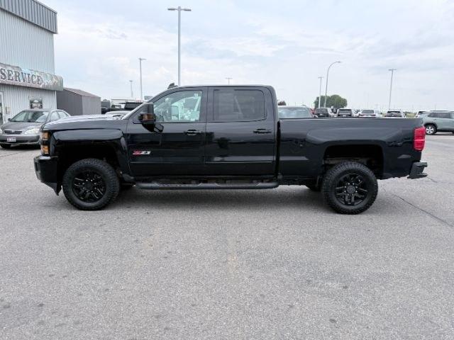 2019 BLACK /Jet Black Chevrolet Silverado 2500HD (1GC1KTEYXKF) with an 66L V8 16V OHV TURBO DIESEL engine, Automatic transmission, located at 1175 N Woodruff Ave, Idaho Falls, ID, 83401, 43.506901, -111.999657 - At Timberline Auto, finding a great deal on your next vehicle is always easy! Our experienced sales staff goal is to help find you the right vehicle at the right price! Our knowledgeable finance department has options for almost any credit score. We offer extended service contract options to prot- Photo#28