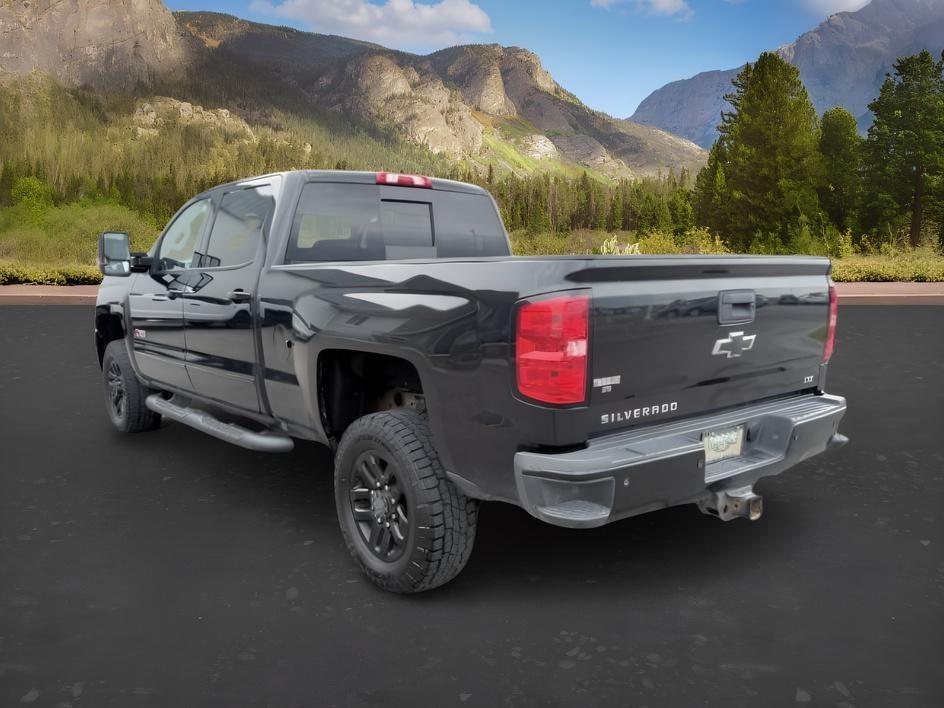 2019 BLACK /Jet Black Chevrolet Silverado 2500HD (1GC1KTEYXKF) with an 66L V8 16V OHV TURBO DIESEL engine, Automatic transmission, located at 1175 N Woodruff Ave, Idaho Falls, ID, 83401, 43.506901, -111.999657 - At Timberline Auto, finding a great deal on your next vehicle is always easy! Our experienced sales staff goal is to help find you the right vehicle at the right price! Our knowledgeable finance department has options for almost any credit score. We offer extended service contract options to prot- Photo#2