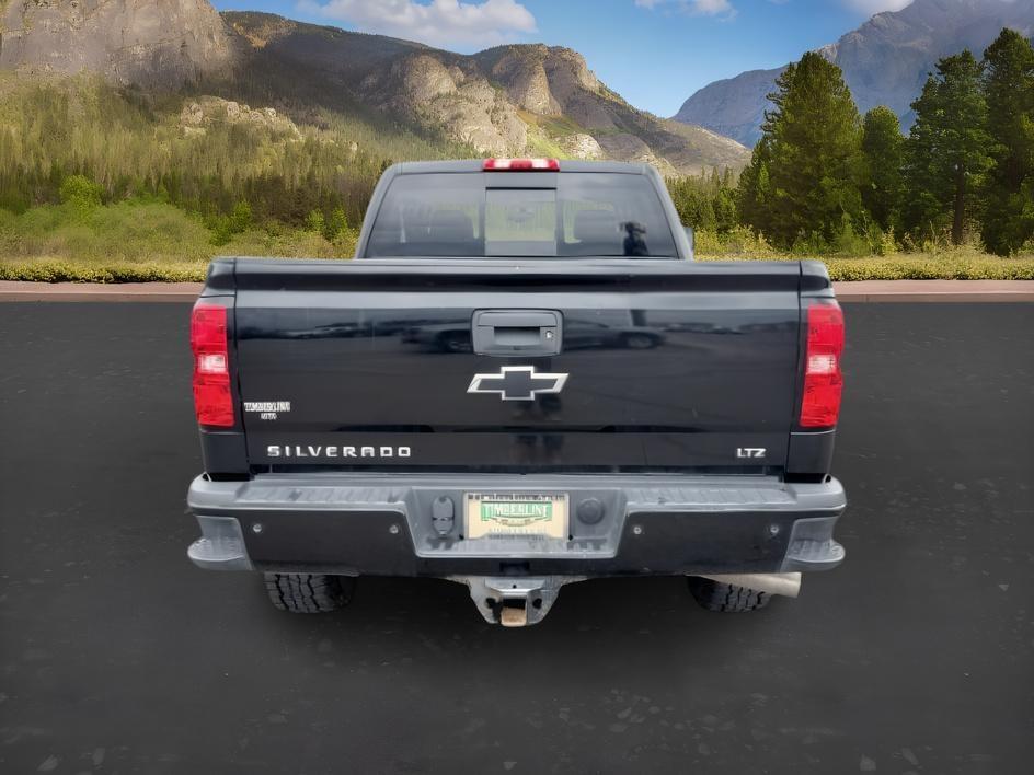 2019 BLACK /Jet Black Chevrolet Silverado 2500HD (1GC1KTEYXKF) with an 66L V8 16V OHV TURBO DIESEL engine, Automatic transmission, located at 1175 N Woodruff Ave, Idaho Falls, ID, 83401, 43.506901, -111.999657 - At Timberline Auto, finding a great deal on your next vehicle is always easy! Our experienced sales staff goal is to help find you the right vehicle at the right price! Our knowledgeable finance department has options for almost any credit score. We offer extended service contract options to prot- Photo#3