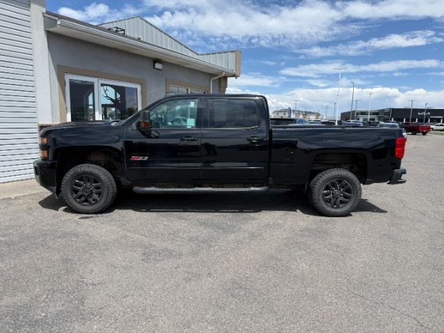2019 BLACK /Jet Black Chevrolet Silverado 2500HD LTZ (1GC1KTEYXKF) with an 6.6L V8 16V OHV TURBO DIESEL engine, AUTOMATIC transmission, located at 1235 N Woodruff Ave., Idaho Falls, 83401, (208) 523-1053, 43.507172, -112.000488 - At Timberline Auto, finding a great deal on your next vehicle is always easy! Our experienced sales staff goal is to help find you the right vehicle at the right price! Our knowledgeable finance department has options for almost any credit score. We offer extended service contract options to prot- Photo#1