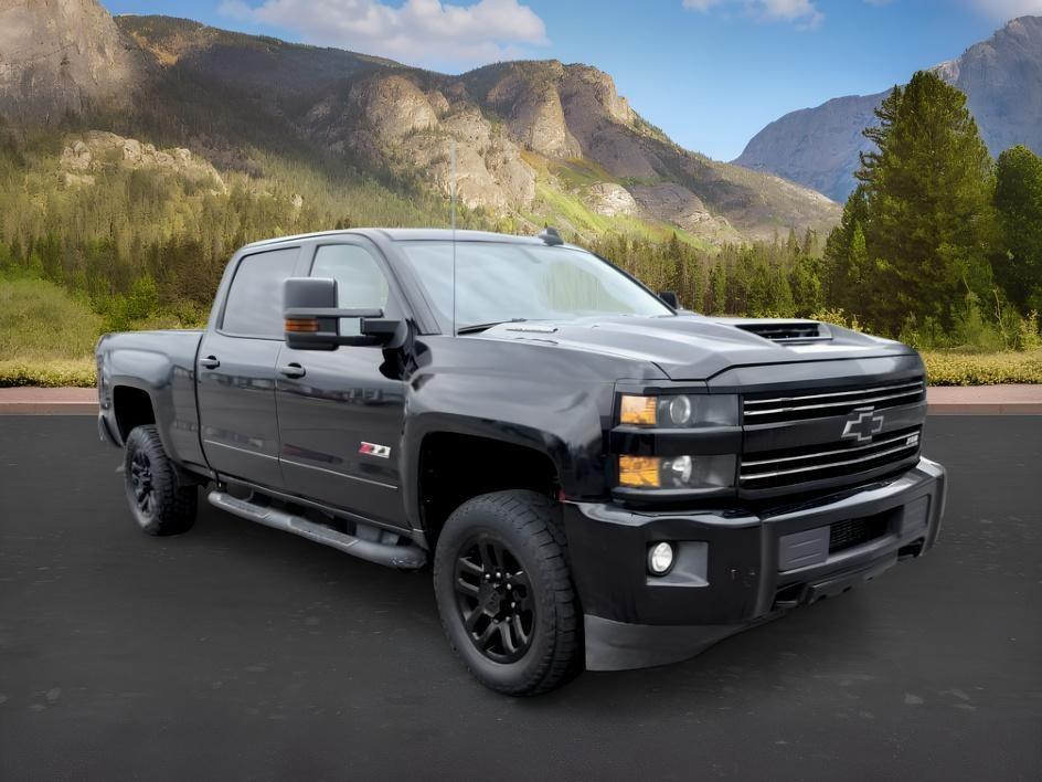 2019 BLACK /Dark Ash/Jet Black Chevrolet Silverado LTZ (1GC1KTEYXKF) with an V8, 6.6L engine, 6-speed automatic transmission, located at 1175 N Woodruff Ave, Idaho Falls, ID, 83401, 43.506901, -111.999657 - <b>Vehicle Details</b><br>Discover rugged capability and premium comfort in this 2019 Chevrolet Silverado 2500 LTZ 4WD, now available in Idaho Falls, ID. Powered by a proven V8 6.6L Diesel engine, this heavy-duty truck is built to tackle demanding jobs, tow with confidence, and deliver dependable pe- Photo#35