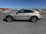 2019 GOLD /Black BMW X4 xDrive30i (5UXUJ3C5XKL) with an 2L I-4 gasoline direct injection engine, AUTOMATIC transmission, located at 1235 N Woodruff Ave., Idaho Falls, 83401, (208) 523-1053, 43.507172, -112.000488 - At Timberline Auto, finding a great deal on your next vehicle is always easy! Our experienced sales staff goal is to help find you the right vehicle at the right price! Our knowledgeable finance department has options for almost any credit score. We offer extended service contract options to prot - Photo#1
