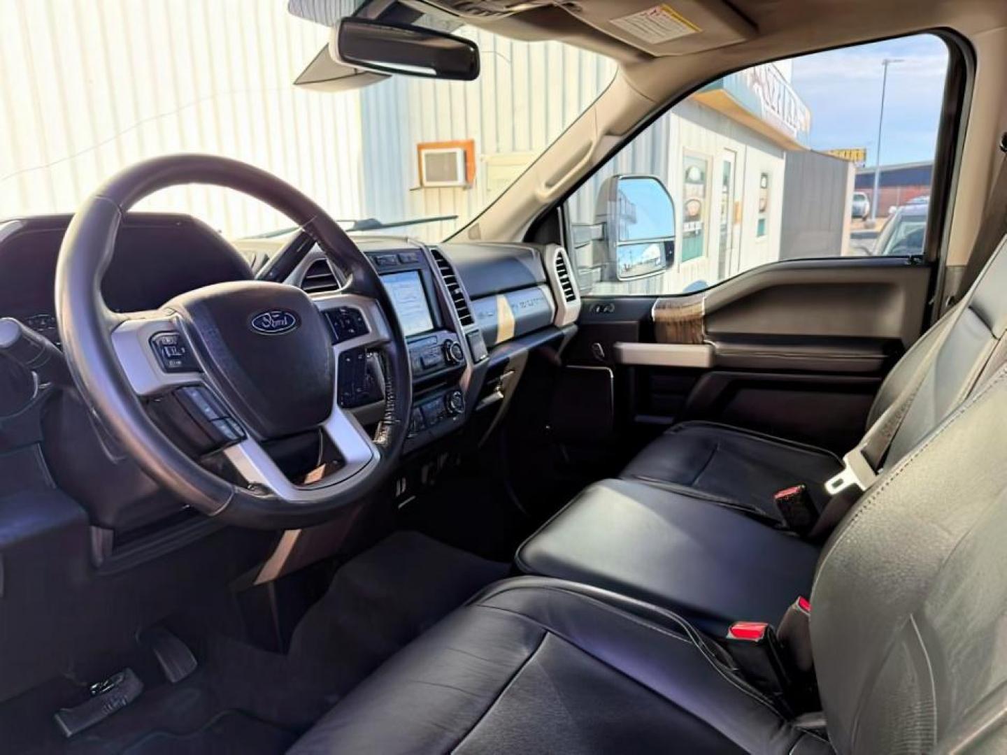 2017 BLACK /Black Ford F-350 (1FT8W3BT0HE) with an Powerstroke 67L V-8 diesel direct injection engine, Automatic transmission, located at 1175 N Woodruff Ave, Idaho Falls, ID, 83401, 43.506901, -111.999657 - At Timberline Auto, finding a great deal on your next vehicle is always easy! Our experienced sales staff goal is to help find you the right vehicle at the right price! Our knowledgeable finance department has options for almost any credit score. We offer extended service contract options to prot- Photo#14