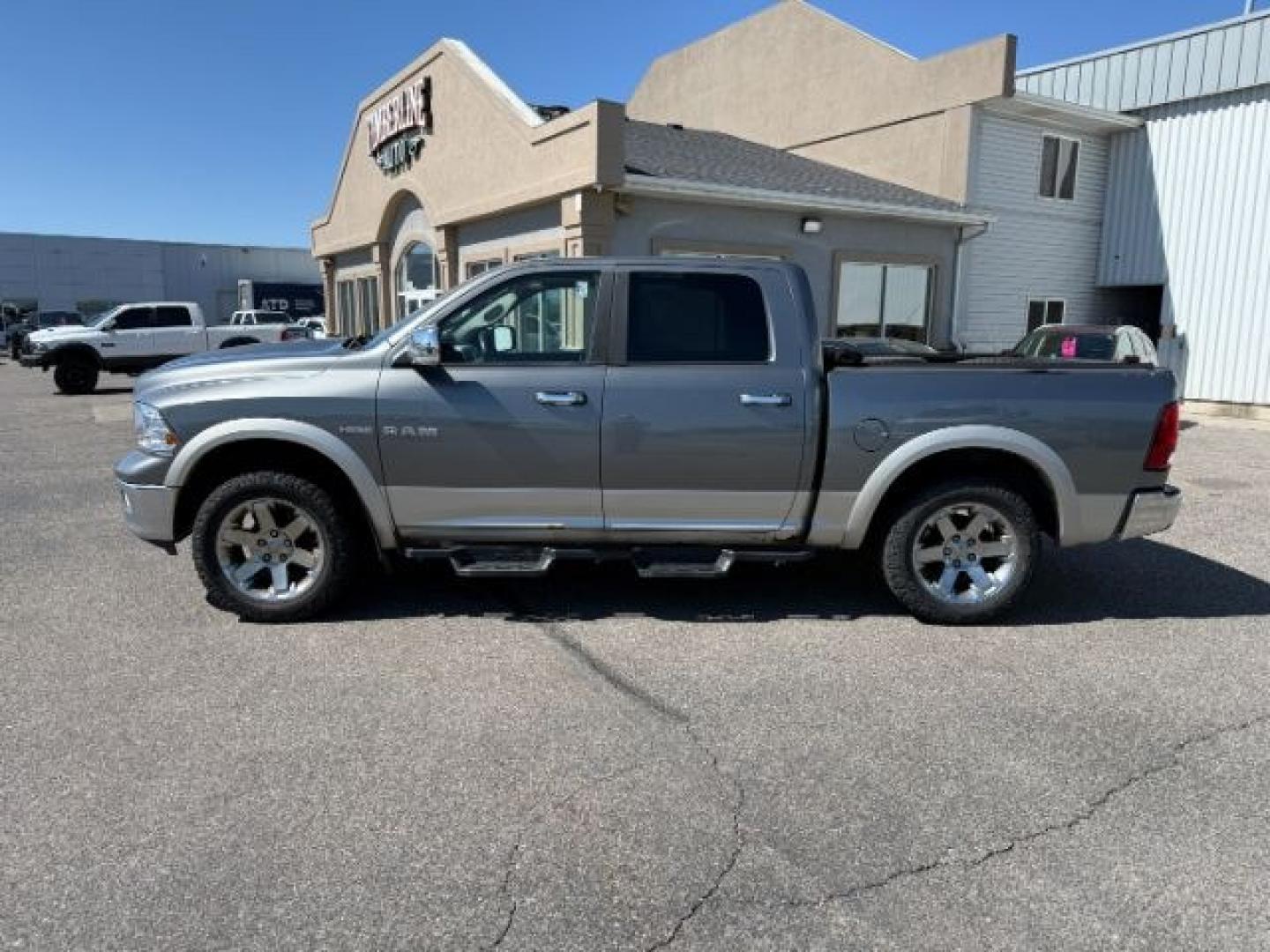 2009 GRAY /Dark Slate Dodge Ram 1500 (1D3HV13T79S) with an HEMI 57L V-8 variable valve control engine, Automatic transmission, located at 1175 N Woodruff Ave, Idaho Falls, ID, 83401, 43.506901, -111.999657 - At Timberline Auto, finding a great deal on your next vehicle is always easy! Our experienced sales staff goal is to help find you the right vehicle at the right price! Our knowledgeable finance department has options for almost any credit score. We offer extended service contract options to prot - Photo#23
