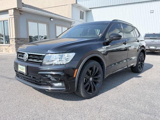 2021 BLACK /LEATHER Volkswagen Tiguan SE R-LINE (3VV2B7AX8MM) with an 2.0 TURBO engine, AUTOMATIC transmission, located at 1235 N Woodruff Ave., Idaho Falls, 83401, (208) 523-1053, 43.507172, -112.000488- Photo#29
