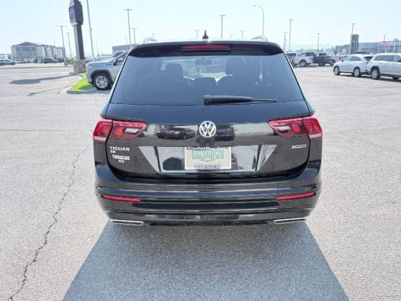 2021 Deep Black Pearl /Titan Black Volkswagen Tiguan SE R-Line Black (3VV2B7AX8MM) with an 4 Cyl, 2.0L engine, 8-speed automatic transmission, located at 1175 N Woodruff Ave, Idaho Falls, ID, 83401, 43.506901, -111.999657- Photo#3