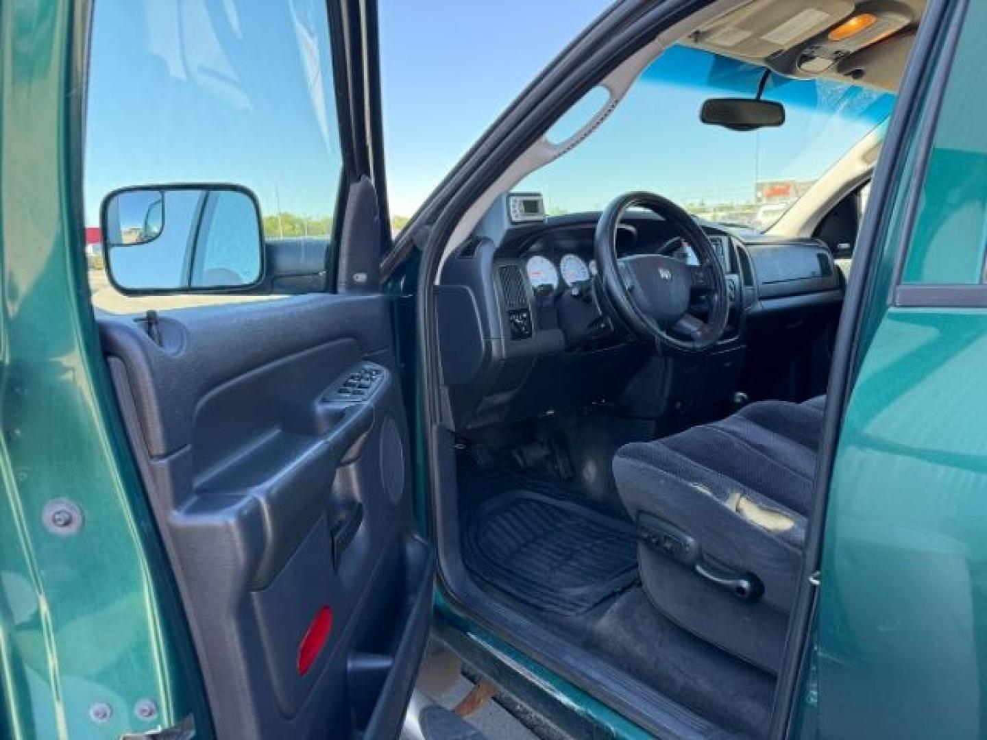 2004 GREEN /Dark Slate Gray Dodge Ram 2500 (3D7KU28C14G) with an Cummins 59L I-6 diesel direct injection engine, Automatic transmission, located at 1175 N Woodruff Ave, Idaho Falls, ID, 83401, 43.506901, -111.999657 - At Timberline Auto, finding a great deal on your next vehicle is always easy! Our experienced sales staff goal is to help find you the right vehicle at the right price! Our knowledgeable finance department has options for almost any credit score. We offer extended service contract options to prot- Photo#10