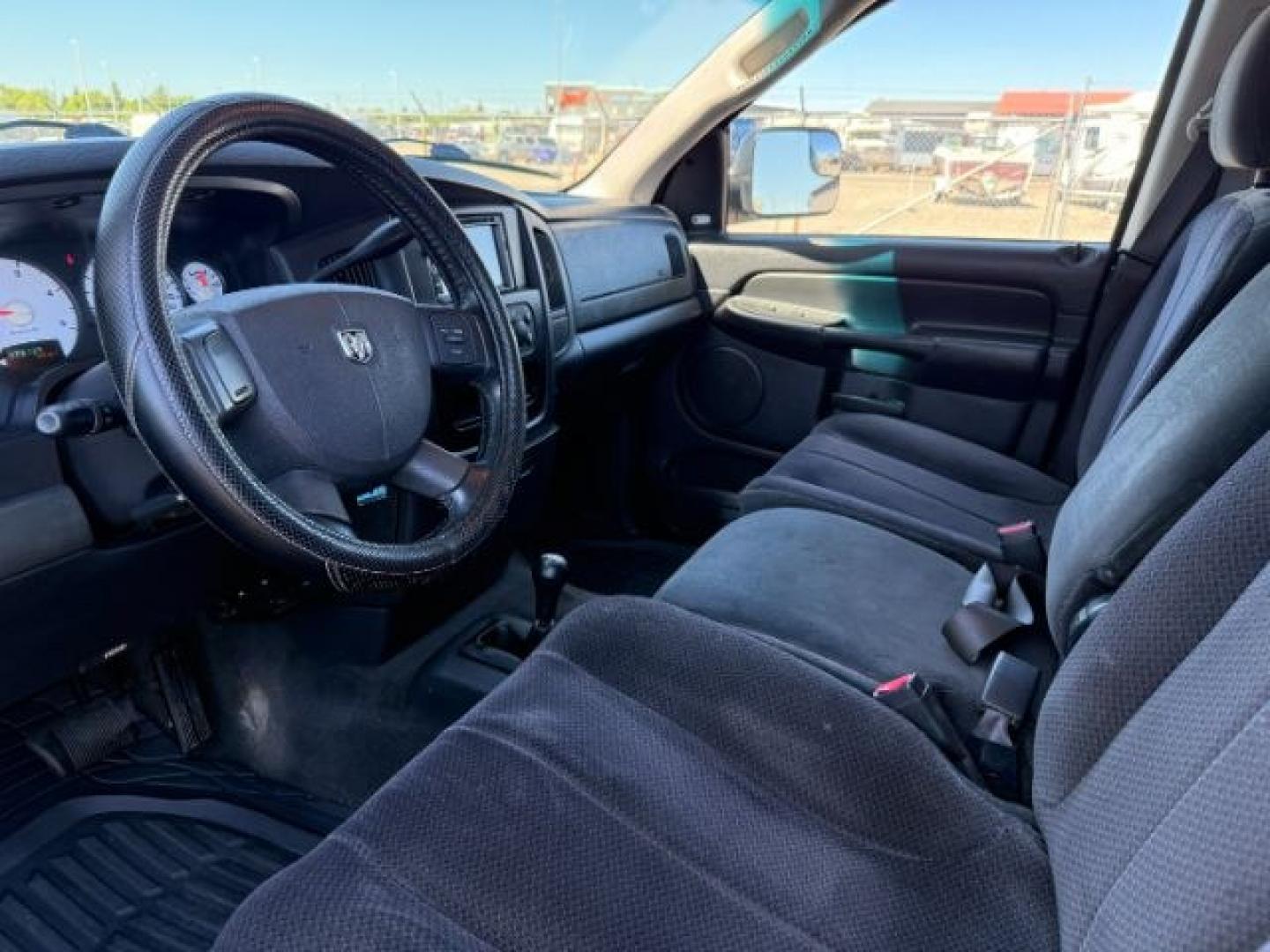 2004 GREEN /Dark Slate Gray Dodge Ram 2500 (3D7KU28C14G) with an Cummins 59L I-6 diesel direct injection engine, Automatic transmission, located at 1175 N Woodruff Ave, Idaho Falls, ID, 83401, 43.506901, -111.999657 - At Timberline Auto, finding a great deal on your next vehicle is always easy! Our experienced sales staff goal is to help find you the right vehicle at the right price! Our knowledgeable finance department has options for almost any credit score. We offer extended service contract options to prot- Photo#12