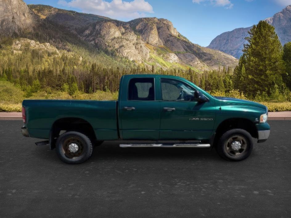 2004 GREEN /Dark Slate Gray Dodge Ram 2500 SLT (3D7KU28C14G) with an Cummins 5.9L I-6 diesel direct injection engine, AUTOMATIC transmission, located at 1235 N Woodruff Ave., Idaho Falls, 83401, (208) 523-1053, 43.507172, -112.000488 - At Timberline Auto, finding a great deal on your next vehicle is always easy! Our experienced sales staff goal is to help find you the right vehicle at the right price! Our knowledgeable finance department has options for almost any credit score. We offer extended service contract options to prot- Photo#5