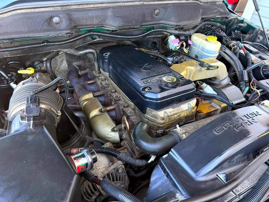 2004 GREEN /Dark Slate Gray Dodge Ram 2500 SLT (3D7KU28C14G) with an Cummins 5.9L I-6 diesel direct injection engine, AUTOMATIC transmission, located at 1235 N Woodruff Ave., Idaho Falls, 83401, (208) 523-1053, 43.507172, -112.000488 - At Timberline Auto, finding a great deal on your next vehicle is always easy! Our experienced sales staff goal is to help find you the right vehicle at the right price! Our knowledgeable finance department has options for almost any credit score. We offer extended service contract options to prot- Photo#22