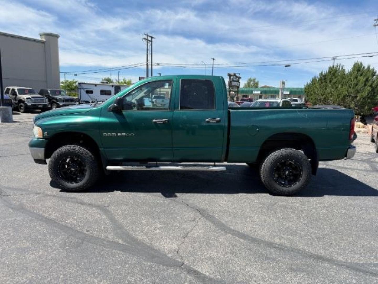 2004 GREEN /Dark Slate Gray Dodge Ram 2500 (3D7KU28C14G) with an Cummins 59L I-6 diesel direct injection engine, Automatic transmission, located at 1175 N Woodruff Ave, Idaho Falls, ID, 83401, 43.506901, -111.999657 - At Timberline Auto, finding a great deal on your next vehicle is always easy! Our experienced sales staff goal is to help find you the right vehicle at the right price! Our knowledgeable finance department has options for almost any credit score. We offer extended service contract options to prot- Photo#1