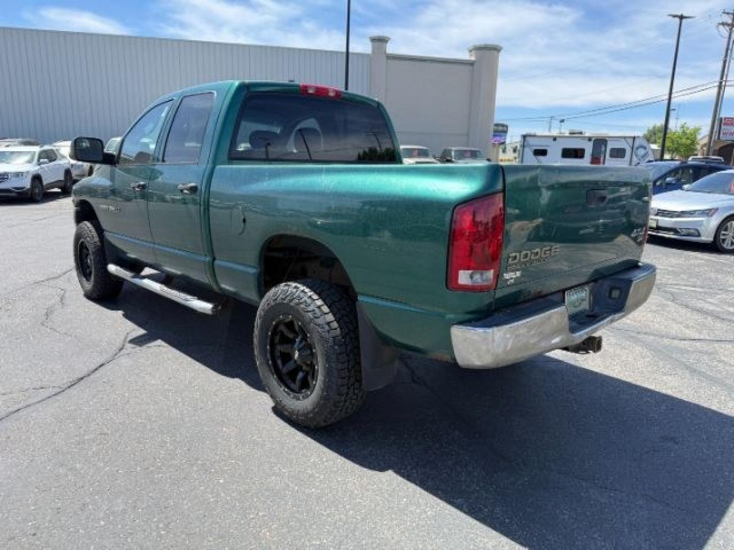 2004 GREEN /Dark Slate Gray Dodge Ram 2500 (3D7KU28C14G) with an Cummins 59L I-6 diesel direct injection engine, Automatic transmission, located at 1175 N Woodruff Ave, Idaho Falls, ID, 83401, 43.506901, -111.999657 - At Timberline Auto, finding a great deal on your next vehicle is always easy! Our experienced sales staff goal is to help find you the right vehicle at the right price! Our knowledgeable finance department has options for almost any credit score. We offer extended service contract options to prot- Photo#2