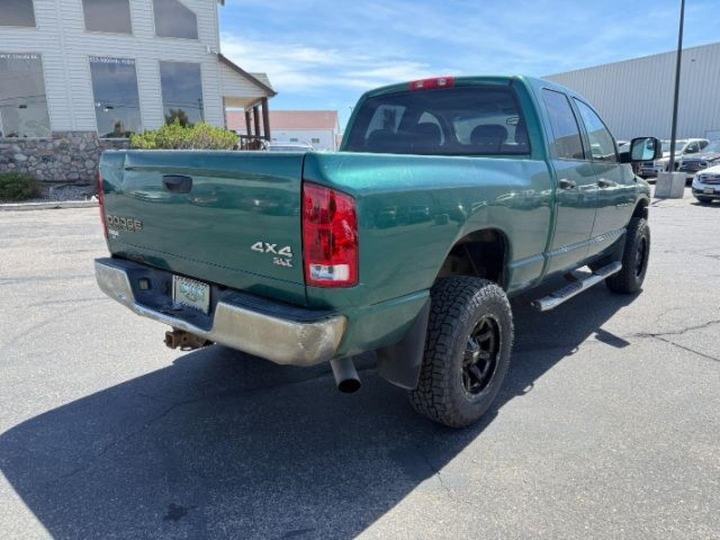 2004 GREEN /Dark Slate Gray Dodge Ram 2500 (3D7KU28C14G) with an Cummins 59L I-6 diesel direct injection engine, Automatic transmission, located at 1175 N Woodruff Ave, Idaho Falls, ID, 83401, 43.506901, -111.999657 - At Timberline Auto, finding a great deal on your next vehicle is always easy! Our experienced sales staff goal is to help find you the right vehicle at the right price! Our knowledgeable finance department has options for almost any credit score. We offer extended service contract options to prot- Photo#4