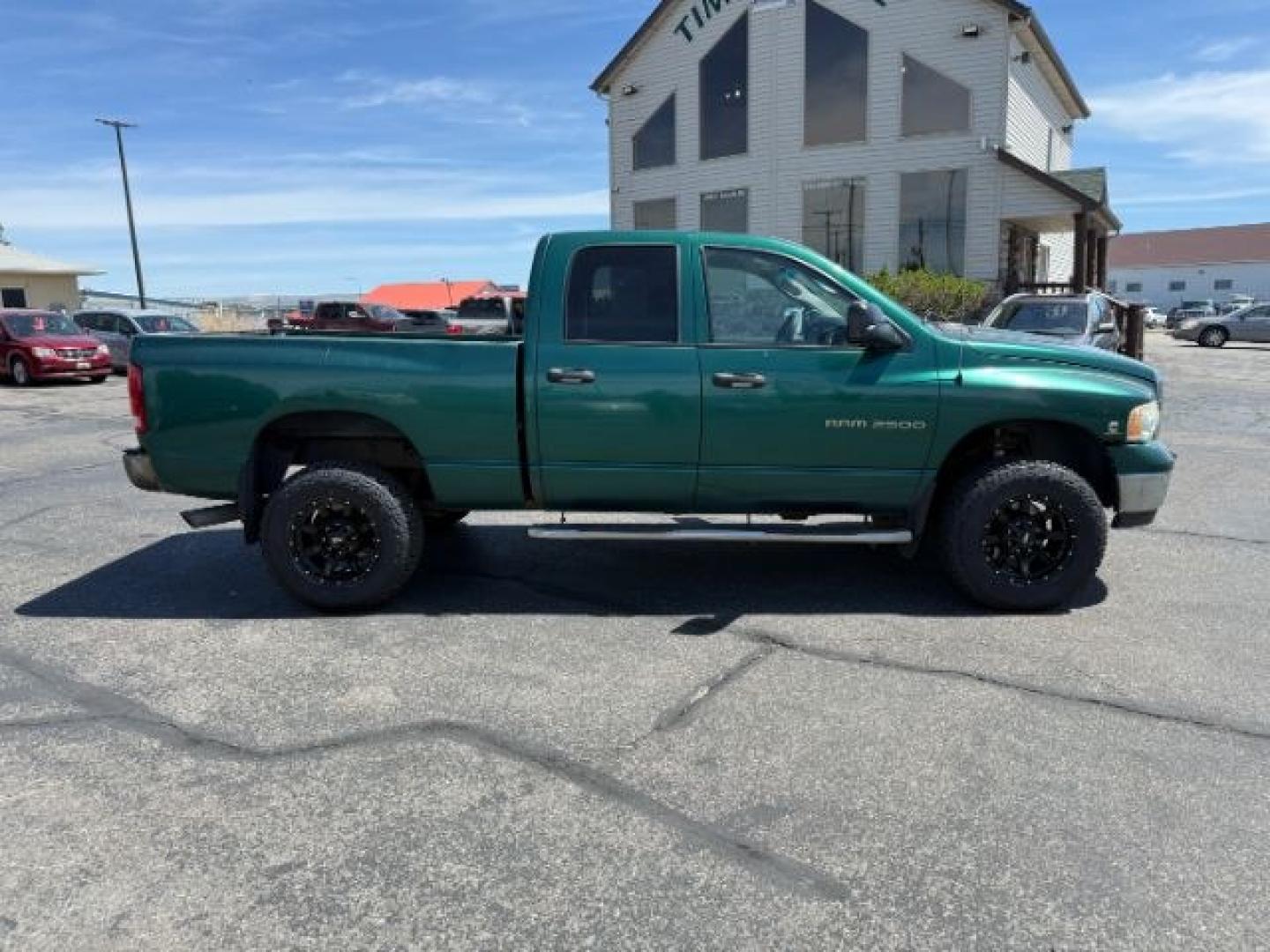 2004 GREEN /Dark Slate Gray Dodge Ram 2500 (3D7KU28C14G) with an Cummins 59L I-6 diesel direct injection engine, Automatic transmission, located at 1175 N Woodruff Ave, Idaho Falls, ID, 83401, 43.506901, -111.999657 - At Timberline Auto, finding a great deal on your next vehicle is always easy! Our experienced sales staff goal is to help find you the right vehicle at the right price! Our knowledgeable finance department has options for almost any credit score. We offer extended service contract options to prot- Photo#5