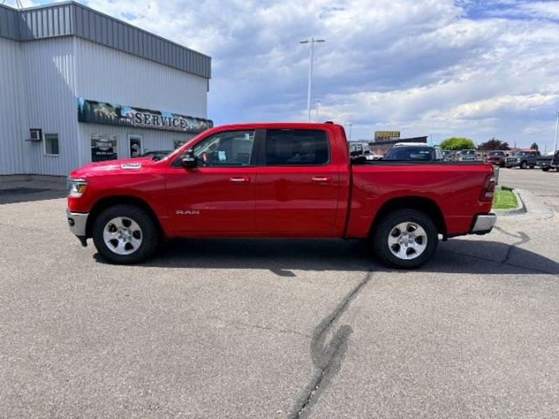 2019 Flame Red Clearcoat /Diesel Gray/Black Ram 1500 Big Horn/Lone Star (1C6SRFFT9KN) with an V8, 5.7L engine, 8-speed automatic transmission, located at 1175 N Woodruff Ave, Idaho Falls, ID, 83401, 43.506901, -111.999657 - <b>Vehicle Details</b><br>Discover capability, comfort, and proven performance in this pre-owned 2019 Ram 1500 Big Horn 4WD, now available in Idaho Falls, ID. Powered by a strong 5.7L V8 gasoline engine, this full-size pickup delivers the muscle needed for towing, hauling, and everyday driving with- Photo#1
