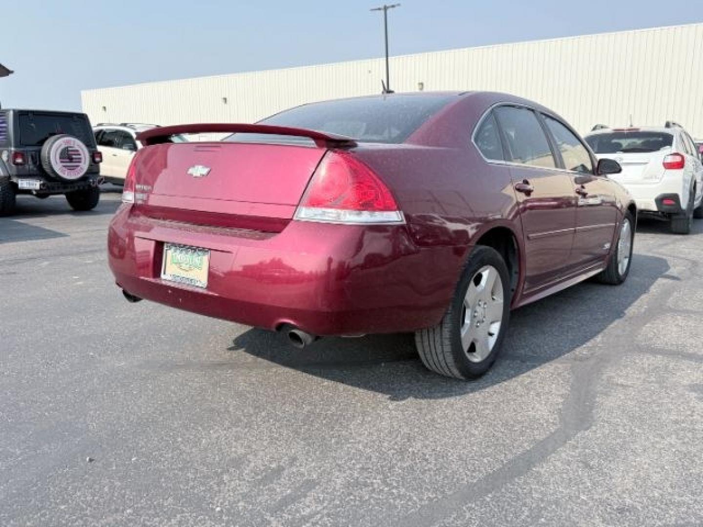 2009 RED /Ebony Leather Interior Chevrolet Impala (2G1WD57C991) with an 53L V8 OHV 16V engine, Automatic transmission, located at 1175 N Woodruff Ave, Idaho Falls, ID, 83401, 43.506901, -111.999657 - At Timberline Auto, finding a great deal on your next vehicle is always easy! Our experienced sales staff goal is to help find you the right vehicle at the right price! Our knowledgeable finance department has options for almost any credit score. We offer extended service contract options to prot- Photo#25
