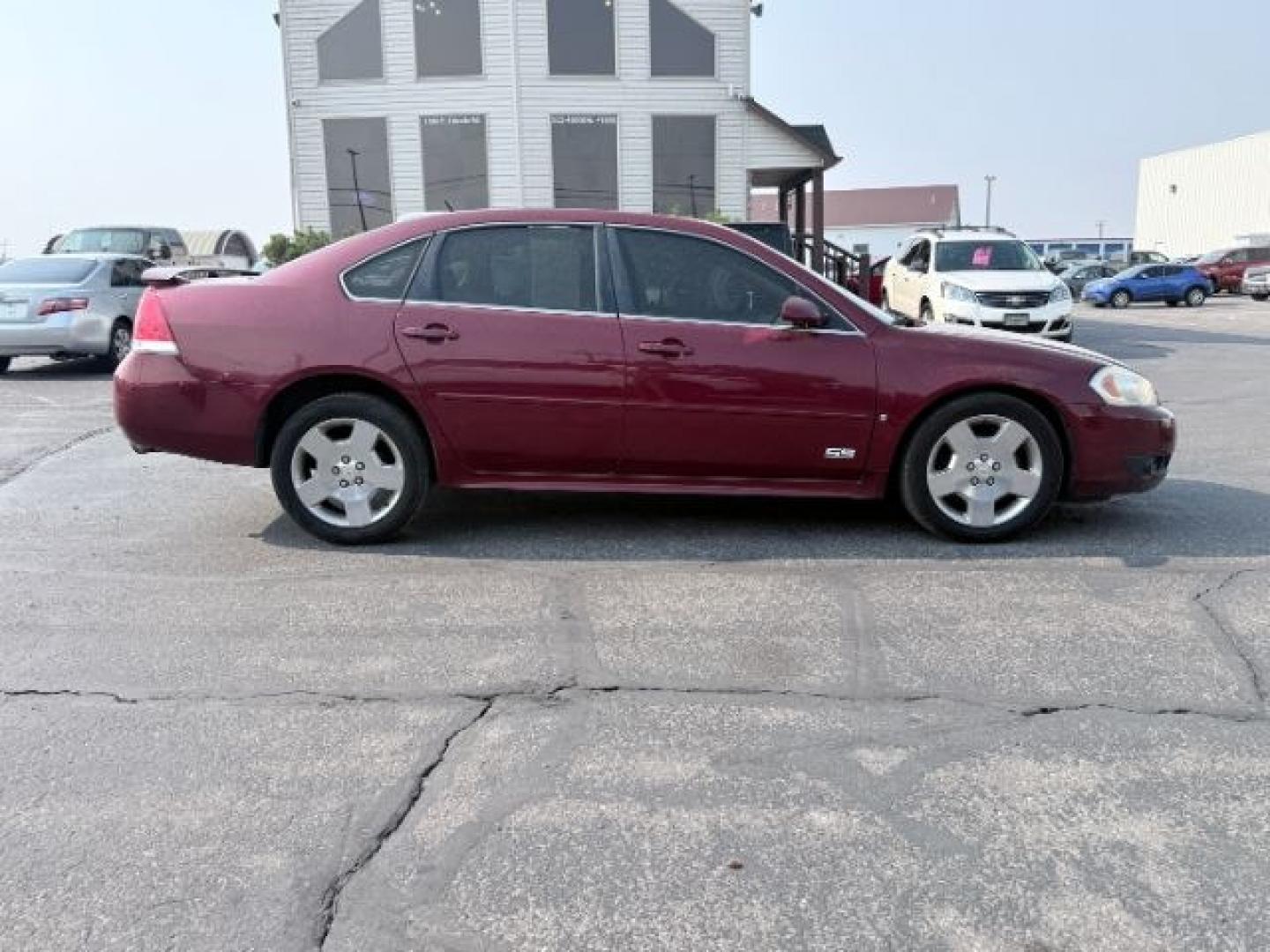 2009 RED /Ebony Leather Interior Chevrolet Impala (2G1WD57C991) with an 53L V8 OHV 16V engine, Automatic transmission, located at 1175 N Woodruff Ave, Idaho Falls, ID, 83401, 43.506901, -111.999657 - At Timberline Auto, finding a great deal on your next vehicle is always easy! Our experienced sales staff goal is to help find you the right vehicle at the right price! Our knowledgeable finance department has options for almost any credit score. We offer extended service contract options to prot- Photo#26