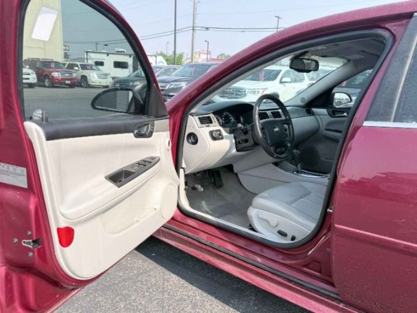 2009 RED /Ebony Leather Interior Chevrolet Impala (2G1WD57C991) with an 53L V8 OHV 16V engine, Automatic transmission, located at 1175 N Woodruff Ave, Idaho Falls, ID, 83401, 43.506901, -111.999657 - At Timberline Auto, finding a great deal on your next vehicle is always easy! Our experienced sales staff goal is to help find you the right vehicle at the right price! Our knowledgeable finance department has options for almost any credit score. We offer extended service contract options to prot- Photo#31