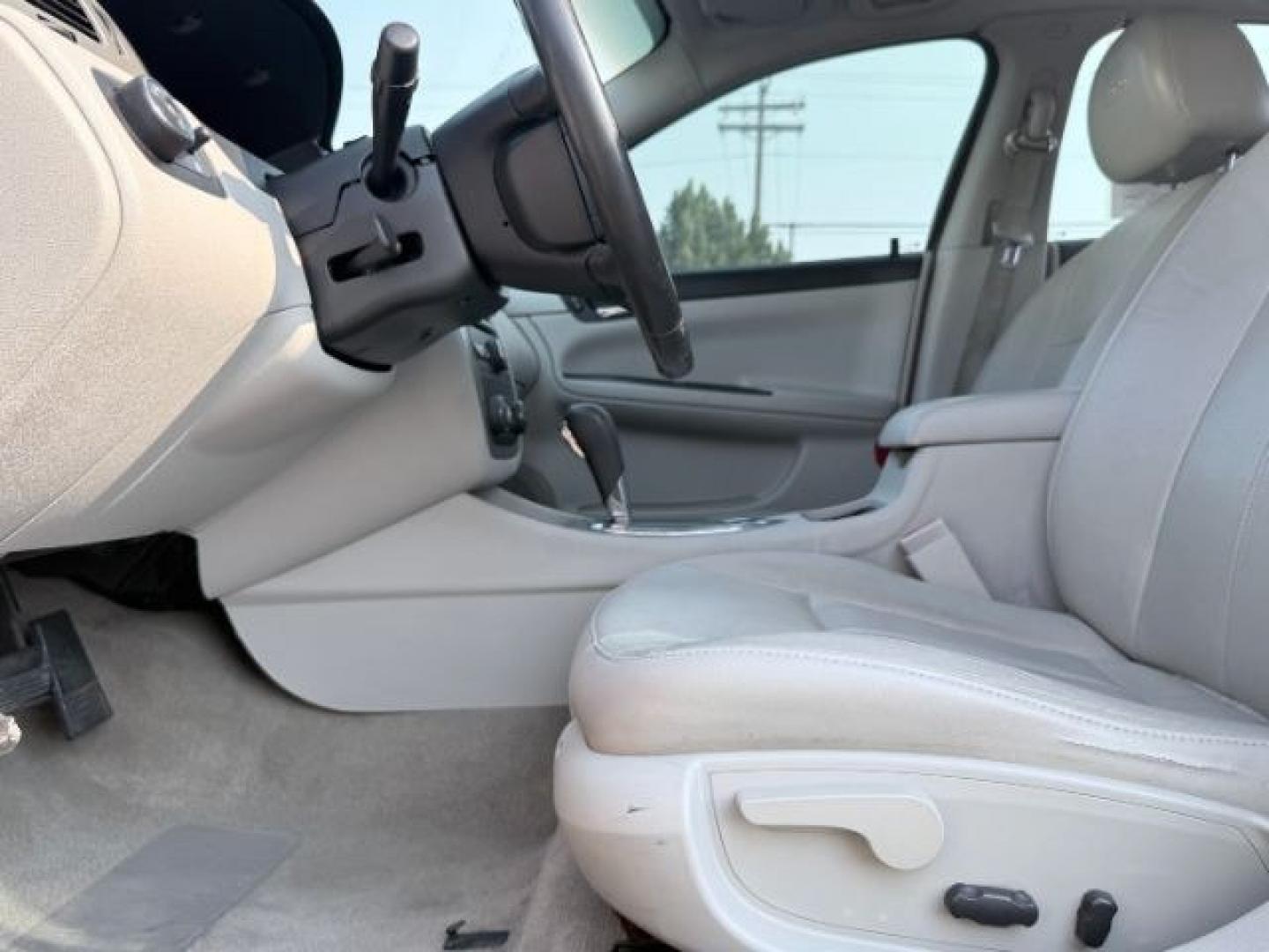 2009 RED /Ebony Leather Interior Chevrolet Impala (2G1WD57C991) with an 53L V8 OHV 16V engine, Automatic transmission, located at 1175 N Woodruff Ave, Idaho Falls, ID, 83401, 43.506901, -111.999657 - At Timberline Auto, finding a great deal on your next vehicle is always easy! Our experienced sales staff goal is to help find you the right vehicle at the right price! Our knowledgeable finance department has options for almost any credit score. We offer extended service contract options to prot- Photo#32