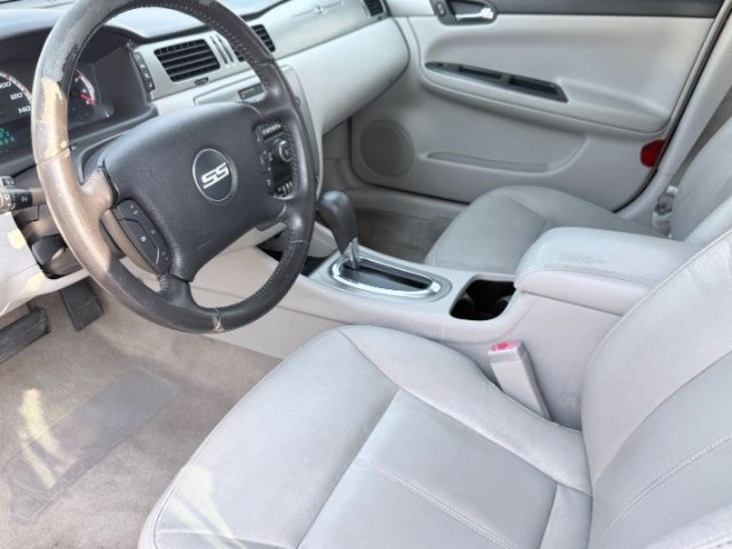 2009 RED /Ebony Leather Interior Chevrolet Impala (2G1WD57C991) with an 53L V8 OHV 16V engine, Automatic transmission, located at 1175 N Woodruff Ave, Idaho Falls, ID, 83401, 43.506901, -111.999657 - At Timberline Auto, finding a great deal on your next vehicle is always easy! Our experienced sales staff goal is to help find you the right vehicle at the right price! Our knowledgeable finance department has options for almost any credit score. We offer extended service contract options to prot- Photo#33