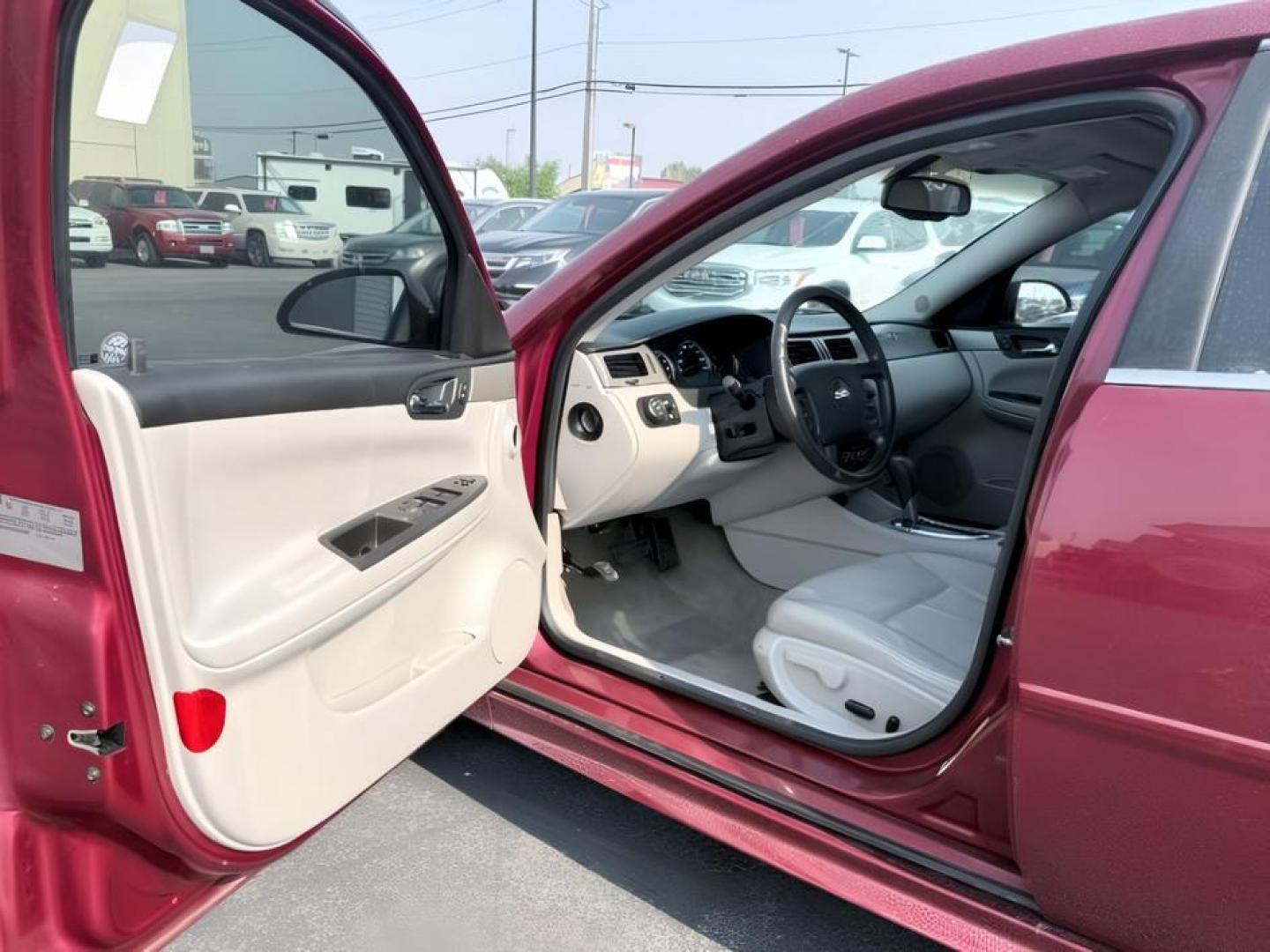 2009 RED /Ebony Leather Interior Chevrolet Impala (2G1WD57C991) with an 53L V8 OHV 16V engine, Automatic transmission, located at 1175 N Woodruff Ave, Idaho Falls, ID, 83401, 43.506901, -111.999657 - At Timberline Auto, finding a great deal on your next vehicle is always easy! Our experienced sales staff goal is to help find you the right vehicle at the right price! Our knowledgeable finance department has options for almost any credit score. We offer extended service contract options to prot- Photo#10