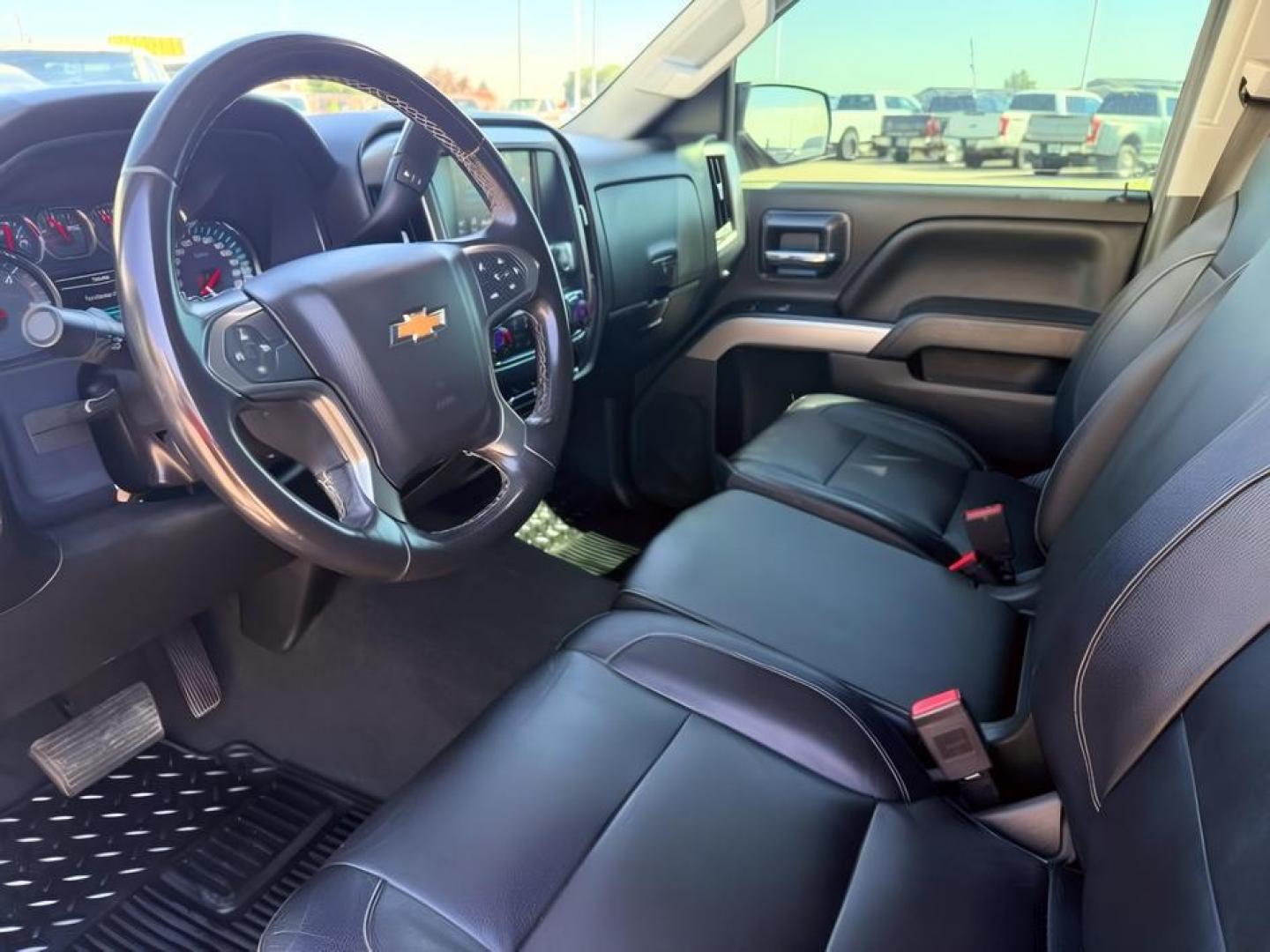 2018 Black /Jet Black Chevrolet Silverado 1500 (3GCUKREC5JG) with an 53L V8 VORTEC engine, Automatic transmission, located at 1175 N Woodruff Ave, Idaho Falls, ID, 83401, 43.506901, -111.999657 - At Timberline Auto, finding a great deal on your next vehicle is always easy! Our experienced sales staff goal is to help find you the right vehicle at the right price! Our knowledgeable finance department has options for almost any credit score. We offer extended service contract options to prot- Photo#14
