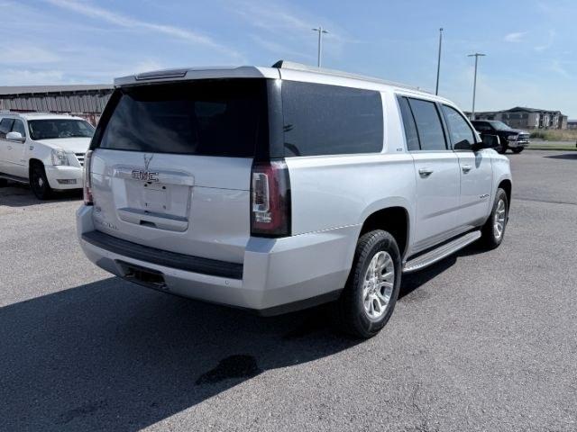 2017 Quicksilver Metallic /Jet Black GMC Yukon XL SLT (1GKS2GKC5HR) with an V8, 5.3L engine, 6-speed automatic transmission, located at 1175 N Woodruff Ave, Idaho Falls, ID, 83401, 43.506901, -111.999657 - <b>Vehicle Details</b><br>This 2017 GMC Yukon XL 1500 SLT 4WD is a spacious, well-appointed full-size SUV designed to deliver comfort, capability, and confidence in one refined package. Powered by a proven V8, 5.3L gasoline engine, it offers strong performance for daily driving, towing, and long roa- Photo#20