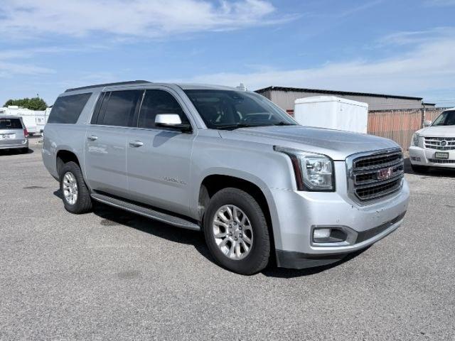 2017 Quicksilver Metallic /Jet Black GMC Yukon XL SLT (1GKS2GKC5HR) with an V8, 5.3L engine, 6-speed automatic transmission, located at 1175 N Woodruff Ave, Idaho Falls, ID, 83401, 43.506901, -111.999657 - <b>Vehicle Details</b><br>This 2017 GMC Yukon XL 1500 SLT 4WD is a spacious, well-appointed full-size SUV designed to deliver comfort, capability, and confidence in one refined package. Powered by a proven V8, 5.3L gasoline engine, it offers strong performance for daily driving, towing, and long roa- Photo#22