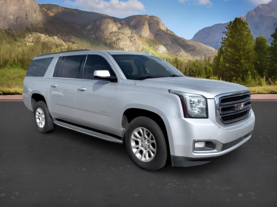2017 Quicksilver Metallic /Jet Black GMC Yukon XL SLT (1GKS2GKC5HR) with an V8, 5.3L engine, 6-speed automatic transmission, located at 1175 N Woodruff Ave, Idaho Falls, ID, 83401, 43.506901, -111.999657 - <b>Vehicle Details</b><br>This 2017 GMC Yukon XL 1500 SLT 4WD is a spacious, well-appointed full-size SUV designed to deliver comfort, capability, and confidence in one refined package. Powered by a proven V8, 5.3L gasoline engine, it offers strong performance for daily driving, towing, and long roa- Photo#14