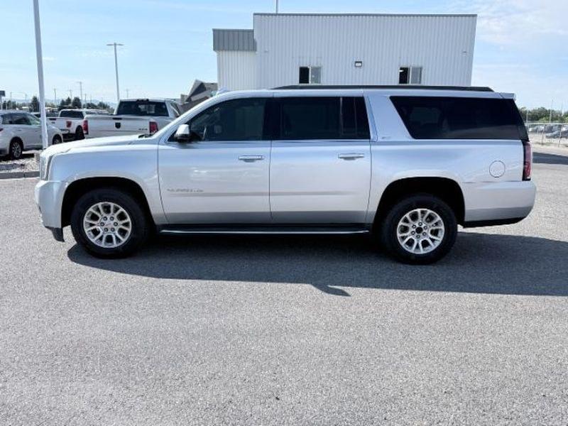 2017 Quicksilver Metallic /Jet Black GMC Yukon XL SLT (1GKS2GKC5HR) with an V8, 5.3L engine, 6-speed automatic transmission, located at 1175 N Woodruff Ave, Idaho Falls, ID, 83401, 43.506901, -111.999657 - <b>Vehicle Details</b><br>This 2017 GMC Yukon XL 1500 SLT 4WD is a spacious, well-appointed full-size SUV designed to deliver comfort, capability, and confidence in one refined package. Powered by a proven V8, 5.3L gasoline engine, it offers strong performance for daily driving, towing, and long roa- Photo#1
