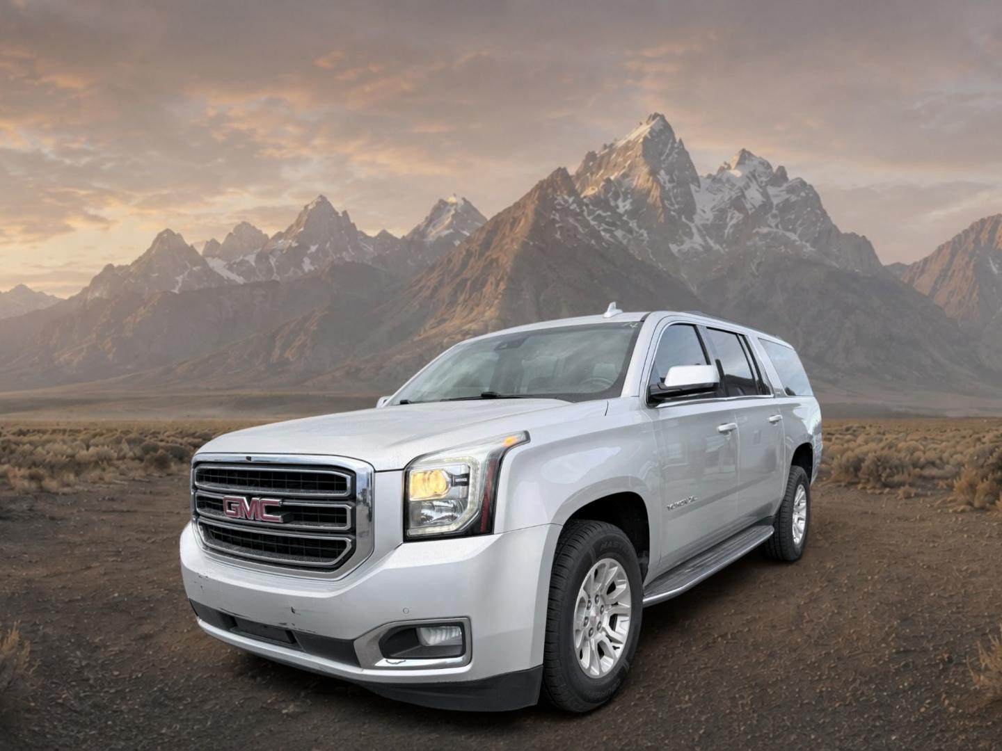 2017 Quicksilver Metallic /Jet Black GMC Yukon XL SLT (1GKS2GKC5HR) with an V8, 5.3L engine, 6-speed automatic transmission, located at 1175 N Woodruff Ave, Idaho Falls, ID, 83401, 43.506901, -111.999657 - <b>Vehicle Details</b><br>This 2017 GMC Yukon XL 1500 SLT 4WD is a spacious, well-appointed full-size SUV designed to deliver comfort, capability, and confidence in one refined package. Powered by a proven V8, 5.3L gasoline engine, it offers strong performance for daily driving, towing, and long roa- Photo#0