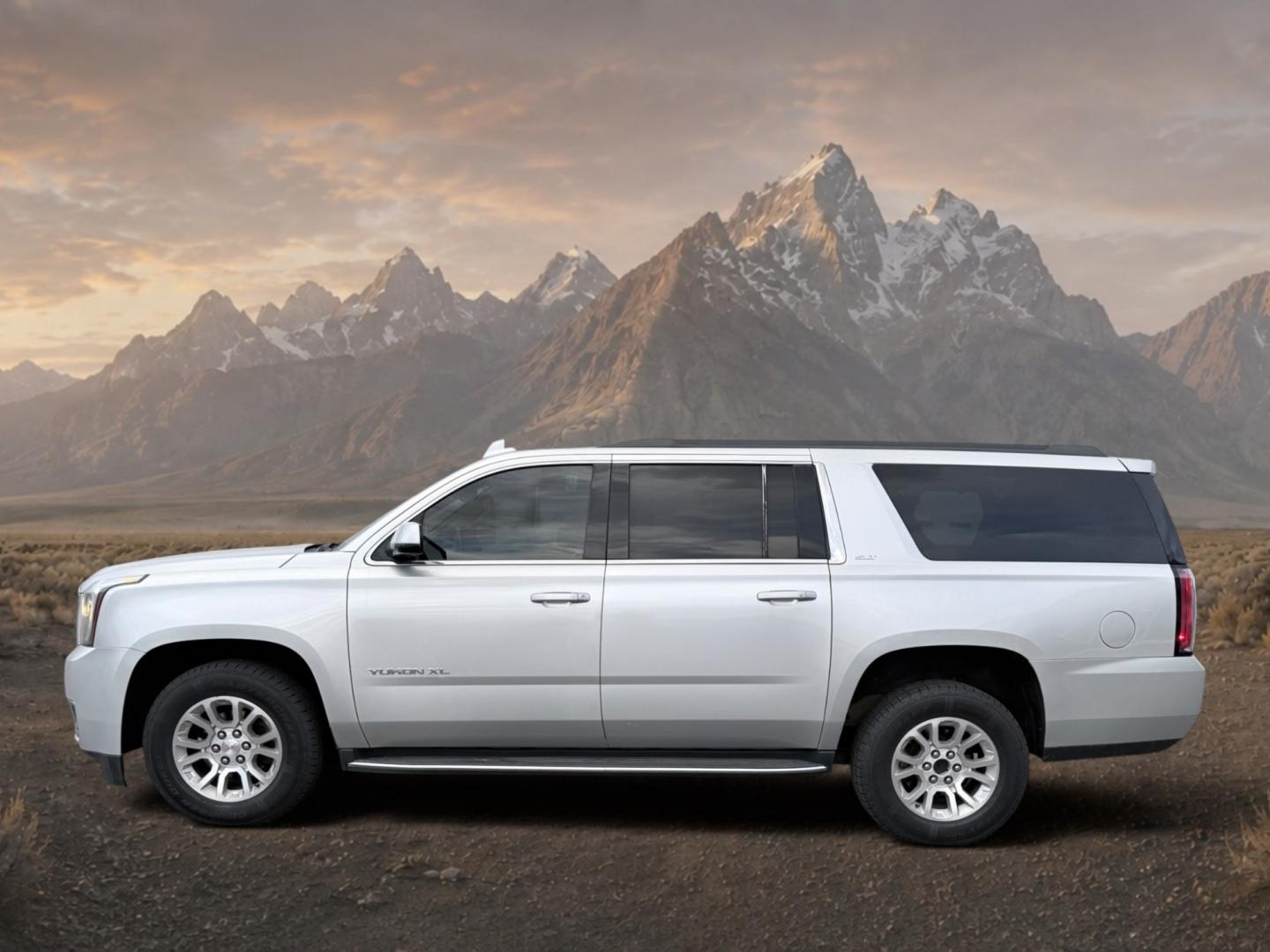 2017 Quicksilver Metallic /Jet Black GMC Yukon XL SLT (1GKS2GKC5HR) with an V8, 5.3L engine, 6-speed automatic transmission, located at 1175 N Woodruff Ave, Idaho Falls, ID, 83401, 43.506901, -111.999657 - <b>Vehicle Details</b><br>This 2017 GMC Yukon XL 1500 SLT 4WD is a spacious, well-appointed full-size SUV designed to deliver comfort, capability, and confidence in one refined package. Powered by a proven V8, 5.3L gasoline engine, it offers strong performance for daily driving, towing, and long roa- Photo#1