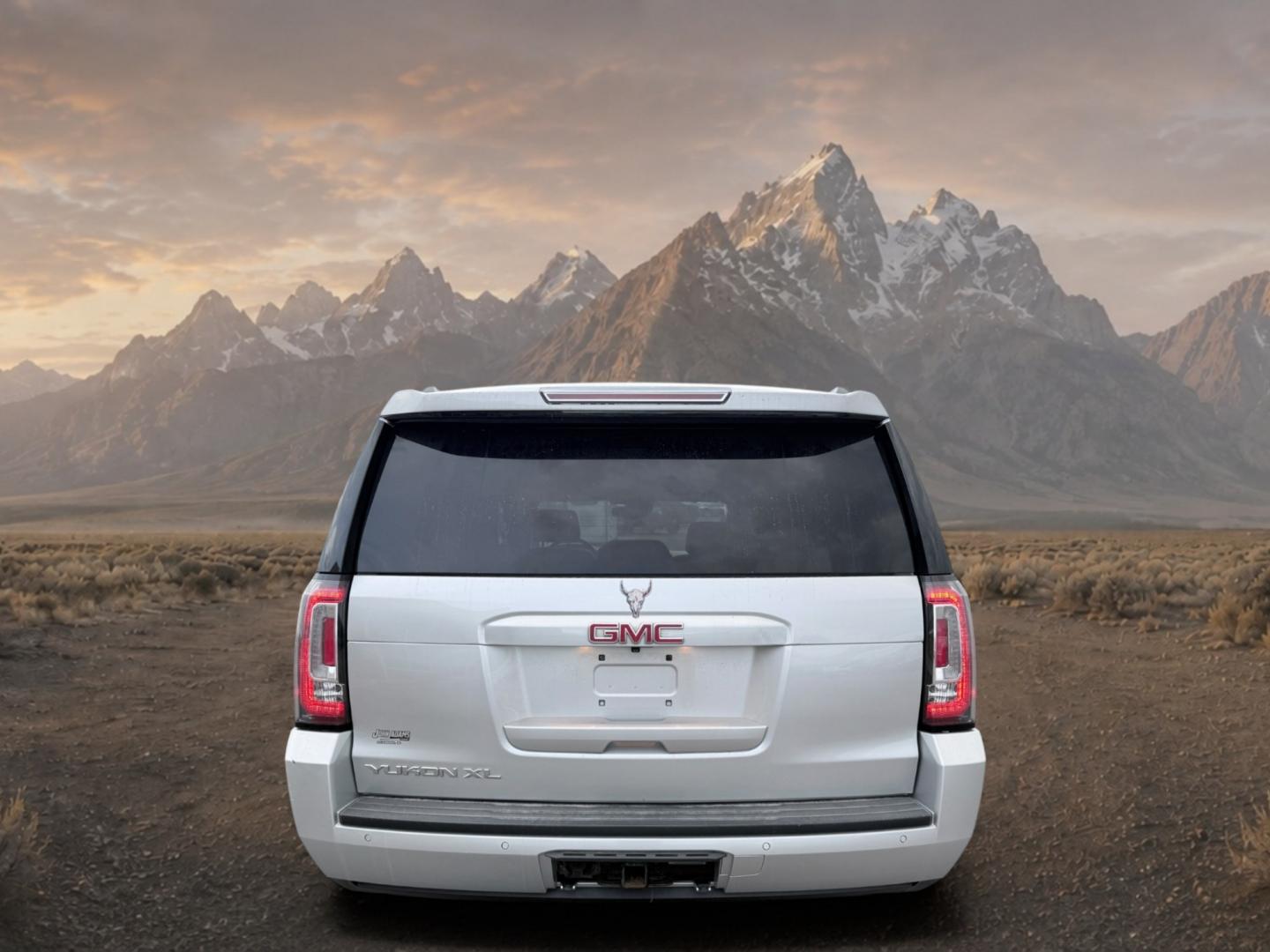 2017 Quicksilver Metallic /Jet Black GMC Yukon XL SLT (1GKS2GKC5HR) with an V8, 5.3L engine, 6-speed automatic transmission, located at 1175 N Woodruff Ave, Idaho Falls, ID, 83401, 43.506901, -111.999657 - <b>Vehicle Details</b><br>This 2017 GMC Yukon XL 1500 SLT 4WD is a spacious, well-appointed full-size SUV designed to deliver comfort, capability, and confidence in one refined package. Powered by a proven V8, 5.3L gasoline engine, it offers strong performance for daily driving, towing, and long roa- Photo#3