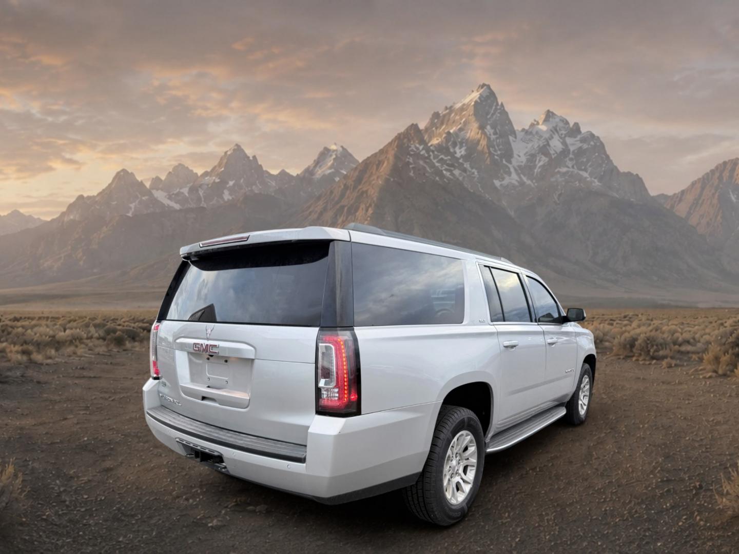 2017 Quicksilver Metallic /Jet Black GMC Yukon XL SLT (1GKS2GKC5HR) with an V8, 5.3L engine, 6-speed automatic transmission, located at 1175 N Woodruff Ave, Idaho Falls, ID, 83401, 43.506901, -111.999657 - <b>Vehicle Details</b><br>This 2017 GMC Yukon XL 1500 SLT 4WD is a spacious, well-appointed full-size SUV designed to deliver comfort, capability, and confidence in one refined package. Powered by a proven V8, 5.3L gasoline engine, it offers strong performance for daily driving, towing, and long roa- Photo#4