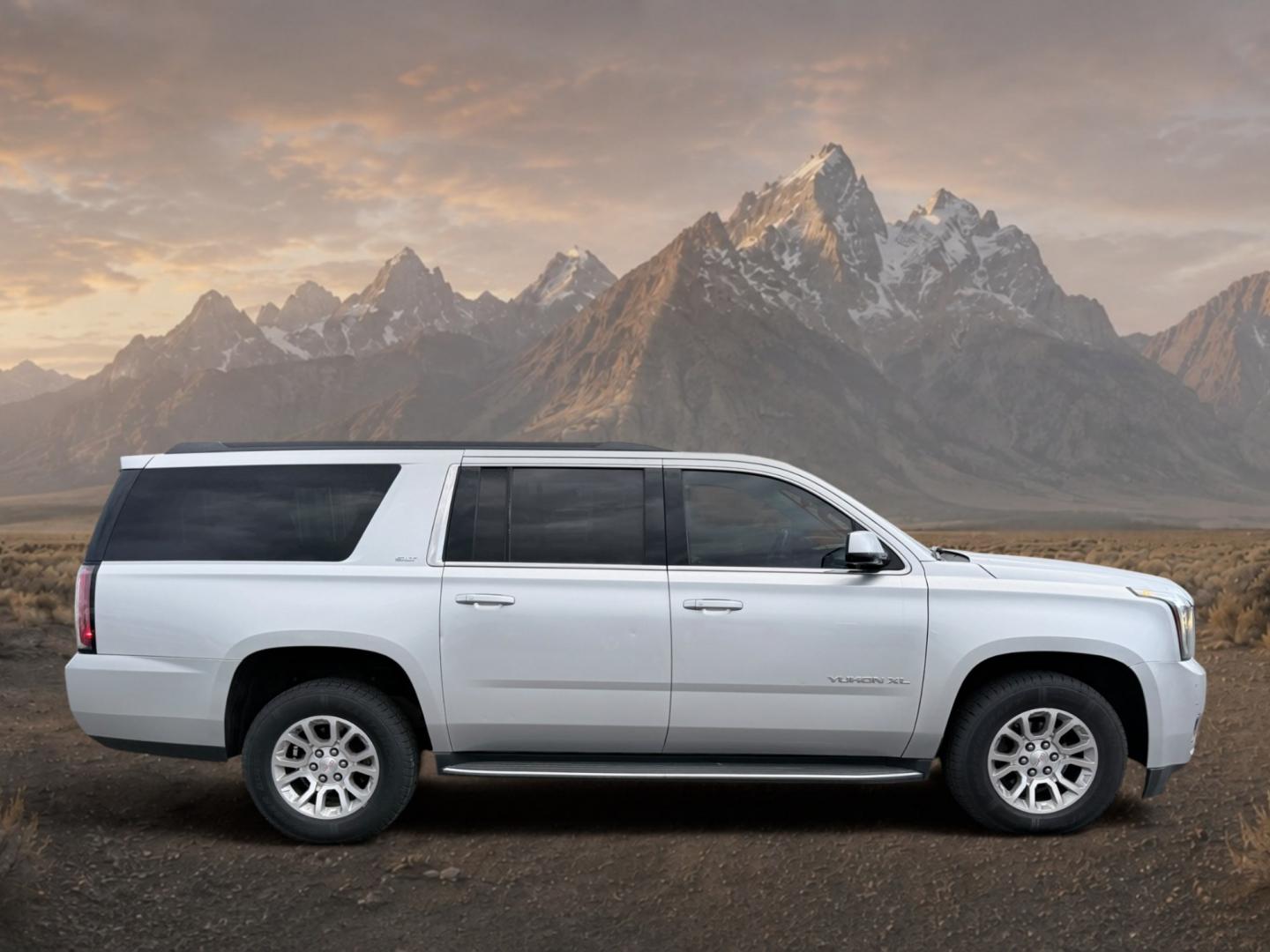 2017 Quicksilver Metallic /Jet Black GMC Yukon XL SLT (1GKS2GKC5HR) with an V8, 5.3L engine, 6-speed automatic transmission, located at 1175 N Woodruff Ave, Idaho Falls, ID, 83401, 43.506901, -111.999657 - <b>Vehicle Details</b><br>This 2017 GMC Yukon XL 1500 SLT 4WD is a spacious, well-appointed full-size SUV designed to deliver comfort, capability, and confidence in one refined package. Powered by a proven V8, 5.3L gasoline engine, it offers strong performance for daily driving, towing, and long roa- Photo#5
