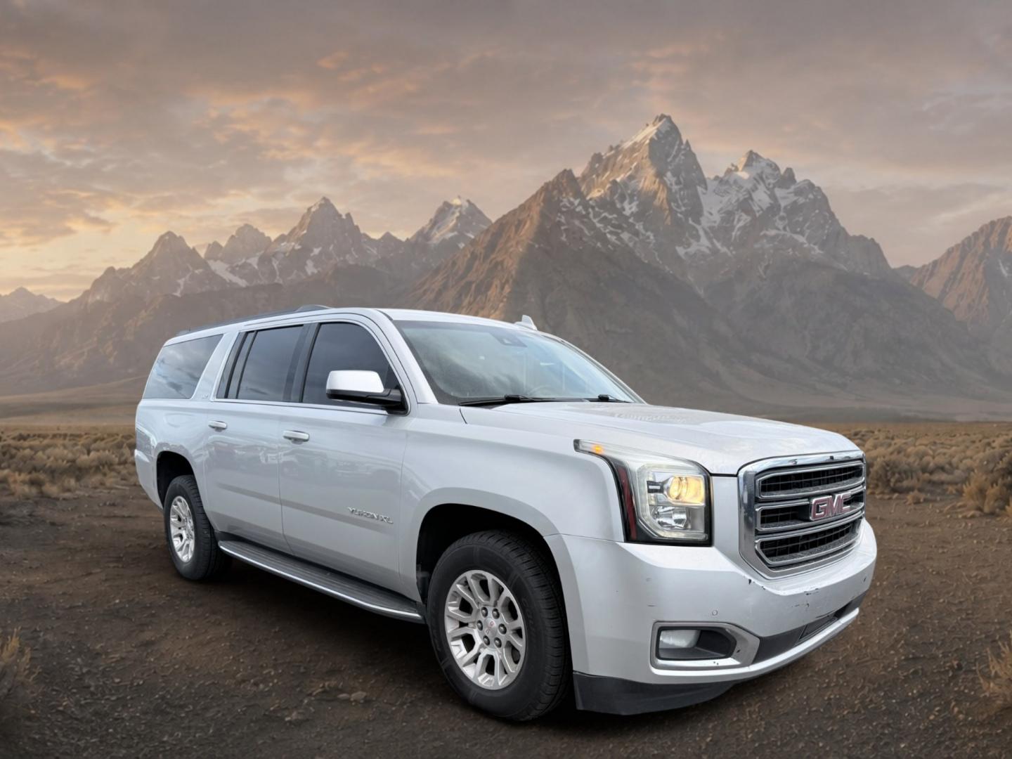 2017 Quicksilver Metallic /Jet Black GMC Yukon XL SLT (1GKS2GKC5HR) with an V8, 5.3L engine, 6-speed automatic transmission, located at 1175 N Woodruff Ave, Idaho Falls, ID, 83401, 43.506901, -111.999657 - <b>Vehicle Details</b><br>This 2017 GMC Yukon XL 1500 SLT 4WD is a spacious, well-appointed full-size SUV designed to deliver comfort, capability, and confidence in one refined package. Powered by a proven V8, 5.3L gasoline engine, it offers strong performance for daily driving, towing, and long roa- Photo#6