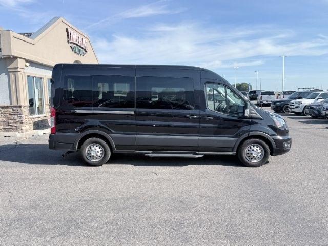 2023 Agate Black Metallic /Ebony Ford Transit Wagon XLT (1FBAX9CG4PK) with an V6, 3.5L engine, 10-speed automatic transmission, located at 1175 N Woodruff Ave, Idaho Falls, ID, 83401, 43.506901, -111.999657 - <b>Vehicle Details</b><br>Ready for your next crew or family hauler? This pre-owned 2023 Ford Transit Wagon T-350 Med Roof Slide XL is a versatile, low-mileage van with just 25,266 miles and the confidence of AWD. Powered by a V6, 3.5L Gasoline engine, it delivers the strength you want for daily dri- Photo#55
