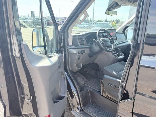 2023 Agate Black Metallic /Ebony Ford Transit Wagon XLT (1FBAX9CG4PK) with an V6, 3.5L engine, 10-speed automatic transmission, located at 1175 N Woodruff Ave, Idaho Falls, ID, 83401, 43.506901, -111.999657 - <b>Vehicle Details</b><br>Ready for your next crew or family hauler? This pre-owned 2023 Ford Transit Wagon T-350 Med Roof Slide XL is a versatile, low-mileage van with just 25,266 miles and the confidence of AWD. Powered by a V6, 3.5L Gasoline engine, it delivers the strength you want for daily dri- Photo#60