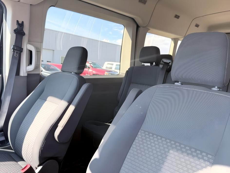 2023 Agate Black Metallic /Ebony Ford Transit Wagon XLT (1FBAX9CG4PK) with an V6, 3.5L engine, 10-speed automatic transmission, located at 1175 N Woodruff Ave, Idaho Falls, ID, 83401, 43.506901, -111.999657 - <b>Vehicle Details</b><br>Ready for your next crew or family hauler? This pre-owned 2023 Ford Transit Wagon T-350 Med Roof Slide XL is a versatile, low-mileage van with just 25,266 miles and the confidence of AWD. Powered by a V6, 3.5L Gasoline engine, it delivers the strength you want for daily dri- Photo#45