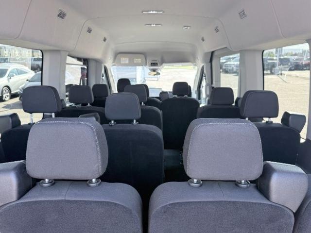 2023 Agate Black Metallic /Ebony Ford Transit Wagon XLT (1FBAX9CGXPK) with an V6, 3.5L engine, 10-speed automatic transmission, located at 1175 N Woodruff Ave, Idaho Falls, ID, 83401, 43.506901, -111.999657 - <b>Vehicle Details</b><br>Looking for a versatile passenger van in Idaho Falls, ID? This pre-owned 2023 Ford Transit Wagon T-350 Med Roof Slide XL with AWD is ready for work, travel, or growing business needs. Powered by a strong V6 3.5L Gasoline engine, this Ford Transit Wagon delivers confident pe- Photo#53