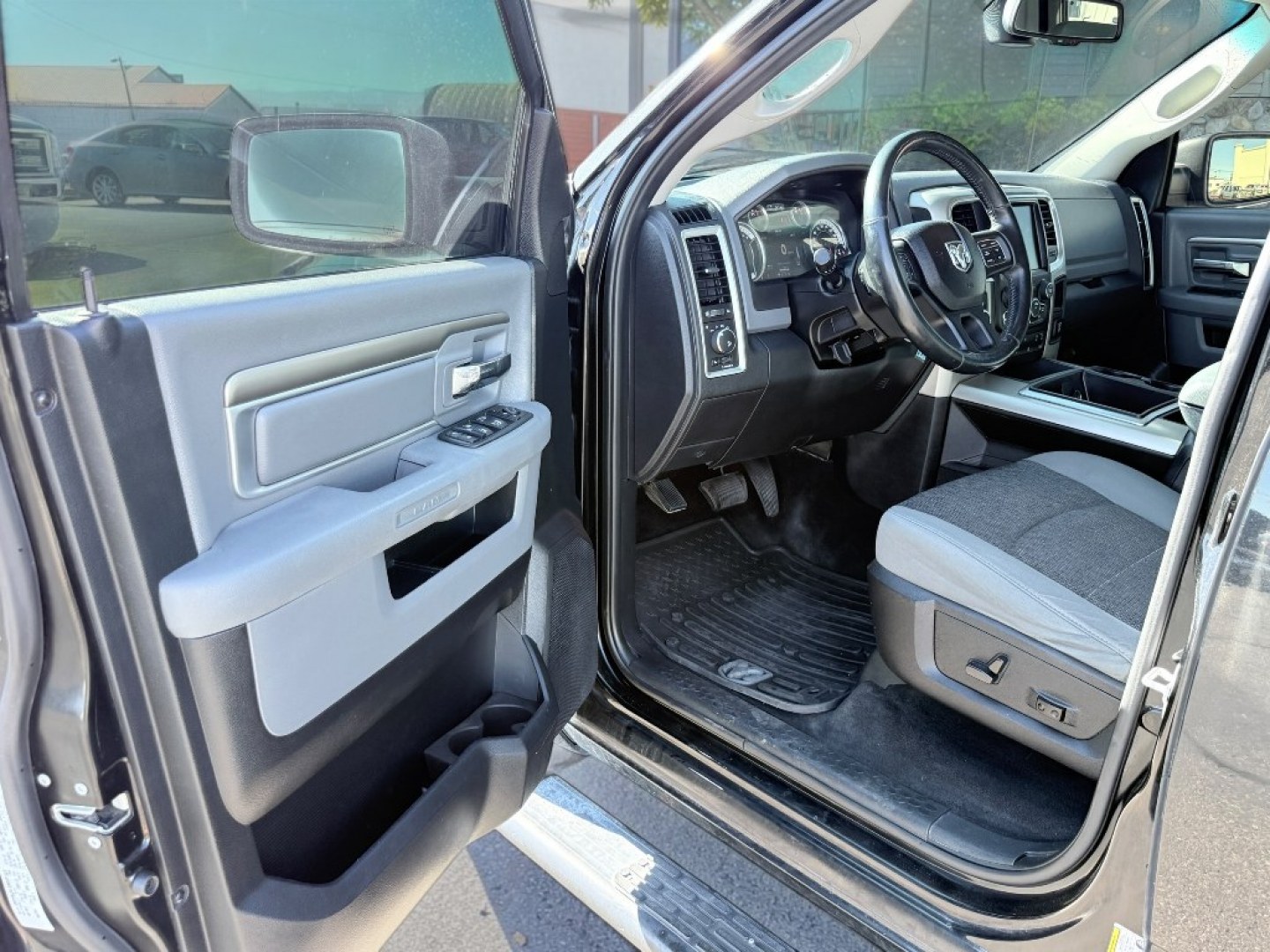 2014 BLACK /Diesel Gray/Black Ram 1500 Outdoorsman (1C6RR7LT9ES) with an V8, 5.7L engine, 8-speed automatic transmission, located at 1175 N Woodruff Ave, Idaho Falls, ID, 83401, 43.506901, -111.999657 - <b>Vehicle Details</b><br>This 2014 Ram 1500 Outdoorsman is a capable full-size pickup that blends rugged strength with everyday comfort. Equipped with 4WD and a powerful V8 5.7L gasoline engine, this truck is built to handle demanding work, weekend adventures, and Idaho's changing road conditions w- Photo#12