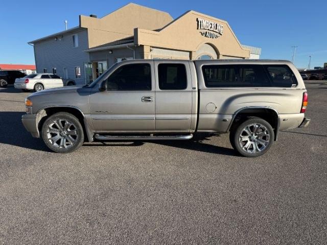 2003 Pewter Metallic /Stone Gray GMC Sierra 1500 Denali (2GTFK69U031) with an Vortec 6L V-8 regular unleaded engine, AUTOMATIC transmission, located at 1235 N Woodruff Ave., Idaho Falls, 83401, (208) 523-1053, 43.507172, -112.000488 - At Timberline Auto, finding a great deal on your next vehicle is always easy! Our experienced sales staff goal is to help find you the right vehicle at the right price! Our knowledgeable finance department has options for almost any credit score. We offer extended service contract options to prot- Photo#1