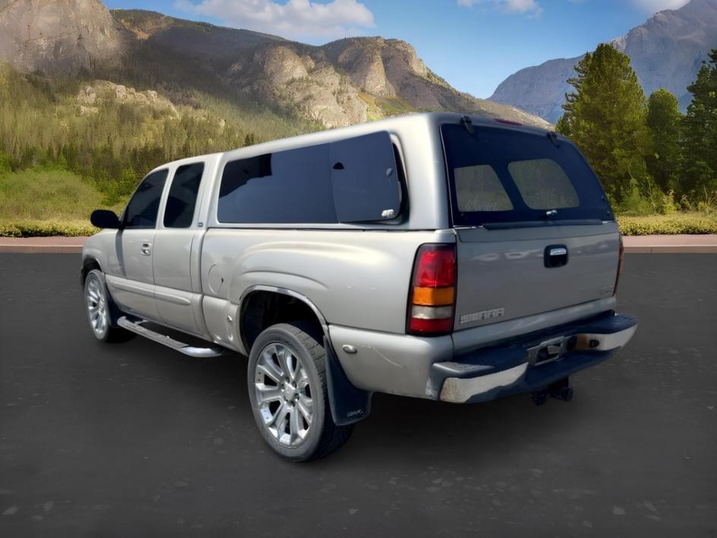 2003 Pewter Metallic /Stone Gray GMC Sierra 1500 (2GTFK69U031) with an Vortec 6L V-8 regular unleaded engine, Automatic transmission, located at 1175 N Woodruff Ave, Idaho Falls, ID, 83401, 43.506901, -111.999657- Photo#2