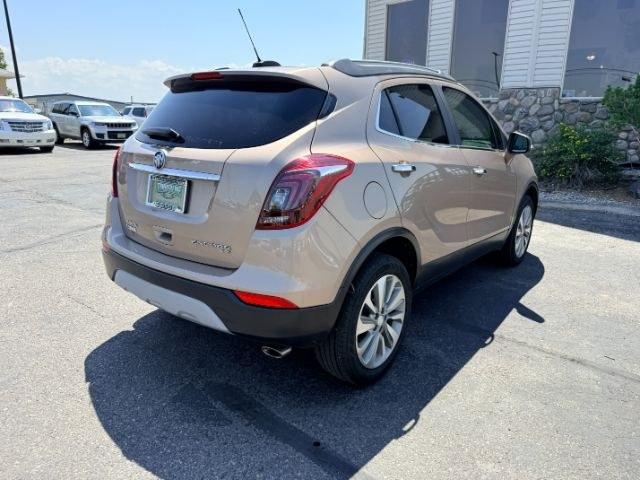 2018 GOLD /Ebony Buick Encore (KL4CJESB7JB) with an ECOTEC 14L I-4 DOHC engine, Automatic transmission, located at 1175 N Woodruff Ave, Idaho Falls, ID, 83401, 43.506901, -111.999657 - At Timberline Auto, finding a great deal on your next vehicle is always easy! Our experienced sales staff goal is to help find you the right vehicle at the right price! Our knowledgeable finance department has options for almost any credit score. We offer extended service contract options to prot- Photo#34