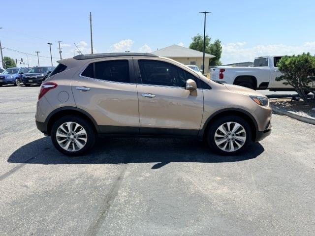 2018 GOLD /Ebony Buick Encore (KL4CJESB7JB) with an ECOTEC 14L I-4 DOHC engine, Automatic transmission, located at 1175 N Woodruff Ave, Idaho Falls, ID, 83401, 43.506901, -111.999657 - At Timberline Auto, finding a great deal on your next vehicle is always easy! Our experienced sales staff goal is to help find you the right vehicle at the right price! Our knowledgeable finance department has options for almost any credit score. We offer extended service contract options to prot- Photo#35