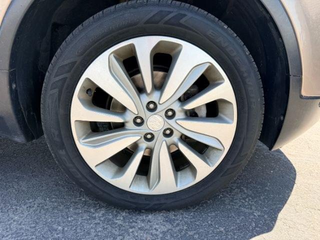 2018 GOLD /Ebony Buick Encore (KL4CJESB7JB) with an ECOTEC 14L I-4 DOHC engine, Automatic transmission, located at 1175 N Woodruff Ave, Idaho Falls, ID, 83401, 43.506901, -111.999657 - At Timberline Auto, finding a great deal on your next vehicle is always easy! Our experienced sales staff goal is to help find you the right vehicle at the right price! Our knowledgeable finance department has options for almost any credit score. We offer extended service contract options to prot- Photo#39