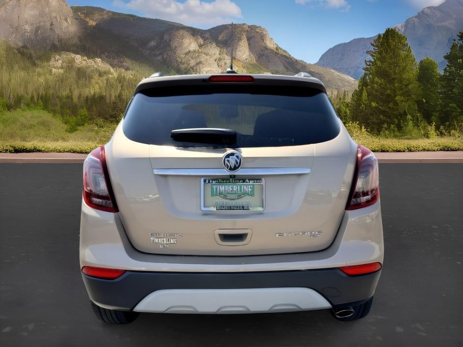 2018 GOLD /Ebony Buick Encore (KL4CJESB7JB) with an ECOTEC 14L I-4 DOHC engine, Automatic transmission, located at 1175 N Woodruff Ave, Idaho Falls, ID, 83401, 43.506901, -111.999657 - At Timberline Auto, finding a great deal on your next vehicle is always easy! Our experienced sales staff goal is to help find you the right vehicle at the right price! Our knowledgeable finance department has options for almost any credit score. We offer extended service contract options to prot- Photo#3