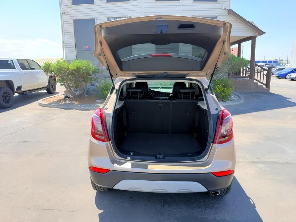 2018 GOLD /Ebony Buick Encore (KL4CJESB7JB) with an ECOTEC 14L I-4 DOHC engine, Automatic transmission, located at 1175 N Woodruff Ave, Idaho Falls, ID, 83401, 43.506901, -111.999657 - At Timberline Auto, finding a great deal on your next vehicle is always easy! Our experienced sales staff goal is to help find you the right vehicle at the right price! Our knowledgeable finance department has options for almost any credit score. We offer extended service contract options to prot- Photo#5